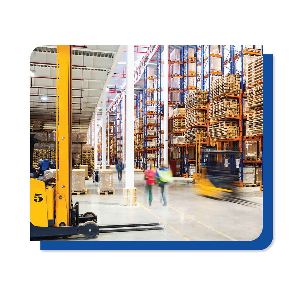 A forklift navigates through a warehouse, transporting goods efficiently among the shelves.